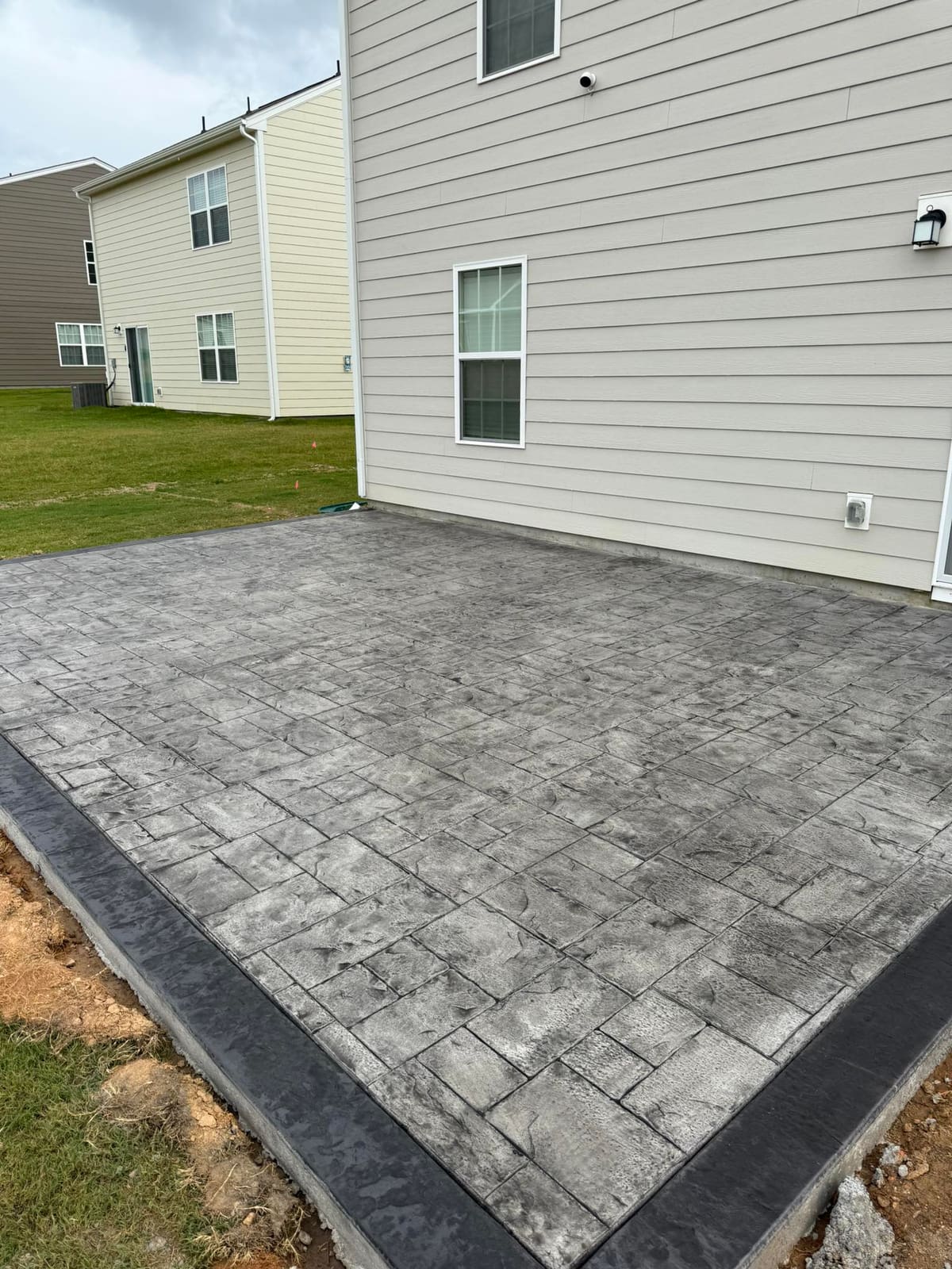 Ashlar-slate stamped concrete patio in Huntersville, NC